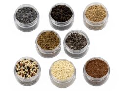 Small sample containers with various seeds